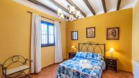 Postel nebo postele na pokoji v ubytování Villa Lagar Martinez Malaga by Ruralidays