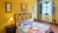 Postel nebo postele na pokoji v ubytování Villa Lagar Martinez Malaga by Ruralidays