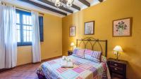 Postel nebo postele na pokoji v ubytování Villa Lagar Martinez Malaga by Ruralidays