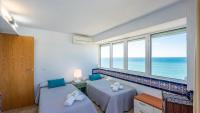 Posteľ alebo postele v izbe v ubytovaní Villa Miramar Rincon de la Victoria by Ruralidays