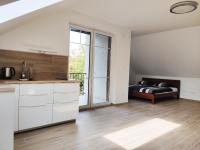 Postel nebo postele na pokoji v ubytování Dali Apartment Szentendre