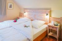 Postel nebo postele na pokoji v ubytování Hotel Landhaus Höpen