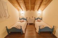 Postel nebo postele na pokoji v ubytování Casa Rural La Galana