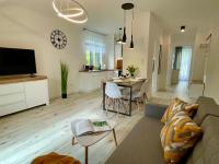 Telewizja i/lub zestaw kina domowego w obiekcie Apartament Jak Marzenie