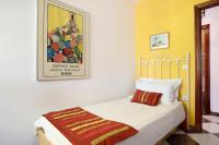 Postel nebo postele na pokoji v ubytování Villa Val de Rosa