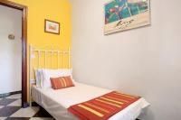 Postel nebo postele na pokoji v ubytování Villa Val de Rosa