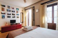 A bed or beds in a room at Divi Apartments Villa Reyes 2