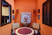 A seating area at Divi Apartments Villa Reyes 2