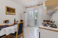 Kuchyň nebo kuchyňský kout v ubytování Apartment in Novi Vinodolski 15312