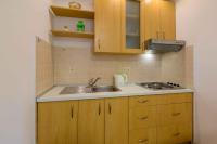 Kuchyň nebo kuchyňský kout v ubytování One-Bedroom Apartment Crikvenica 4
