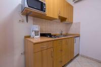 Kuchyň nebo kuchyňský kout v ubytování One-Bedroom Apartment in Crikvenica 8