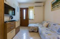 Postel nebo postele na pokoji v ubytování One-Bedroom Apartment in Crikvenica 8