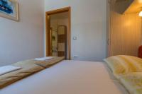 Postel nebo postele na pokoji v ubytování One-Bedroom Apartment in Crikvenica 8