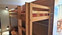 Uma ou mais camas em beliche em um quarto em travelski home classic - Vue Pistes