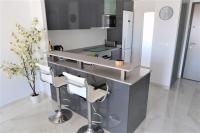 A kitchen or kitchenette at Flamenca Village Penthouse