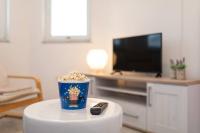 Televízia a/alebo spoločenská miestnosť v ubytovaní Apartments Doris, Krk