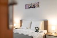 Posteľ alebo postele v izbe v ubytovaní Apartments Doris, Krk