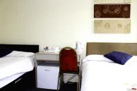 Henson Hotel Pleasure Beachにあるベッド