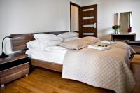 Posteľ alebo postele v izbe v ubytovaní P&O Serviced Apartments Bukowinska