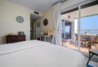 Postel nebo postele na pokoji v ubytování Penthouse Boulevard 401