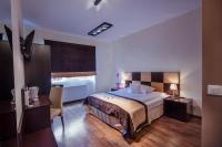 Posteľ alebo postele v izbe v ubytovaní Boutique Hotel's Bytom