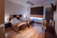 Posteľ alebo postele v izbe v ubytovaní Boutique Hotel's Bytom