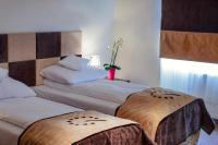 Posteľ alebo postele v izbe v ubytovaní Boutique Hotel's Bytom