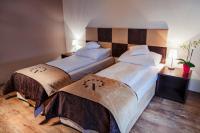 Posteľ alebo postele v izbe v ubytovaní Boutique Hotel's Bytom