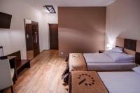 Posteľ alebo postele v izbe v ubytovaní Boutique Hotel's Bytom