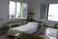 Łóżko lub łóżka w pokoju w obiekcie Apartamentos Los Vientos (Apto 8)