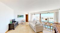 A television and/or entertainment centre at Lomas de los Monteros - Apartment with seaviews