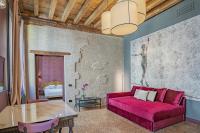 A seating area at Corte Rubbi 7 Deluxe Apartment