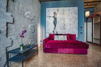 A bed or beds in a room at Corte Rubbi 7 Deluxe Apartment