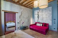 A bed or beds in a room at Corte Rubbi 7 Deluxe Apartment