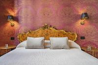 A bed or beds in a room at Corte Rubbi 7 Deluxe Apartment