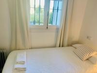 Postel nebo postele na pokoji v ubytování Stay Wild en Las Casitas de Huerta Arriba