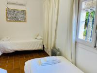 Postel nebo postele na pokoji v ubytování Stay Wild en Las Casitas de Huerta Arriba