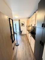 Kuchyň nebo kuchyňský kout v ubytování Apartmán u jezera Lipno - Nové