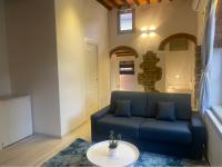 A seating area at La Torre di Borgunto - Piazza Grande