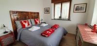 Posteľ alebo postele v izbe v ubytovaní Maison Venera - Relax Appartaments in Valtournenche