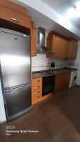 Kuchyň nebo kuchyňský kout v ubytování Piso Casa Reina Un lugar cerca del mar y el puerto