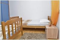 Postel nebo postele na pokoji v ubytování Apartments Luciano