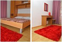 Postel nebo postele na pokoji v ubytování Apartments Luciano