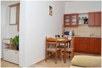 Kuchyň nebo kuchyňský kout v ubytování Apartments Luciano