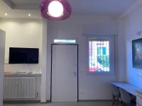Televízia a/alebo spoločenská miestnosť v ubytovaní Casa Cirenaica Art House