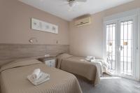 Postel nebo postele na pokoji v ubytování Villa La Casita Burriana Nerja