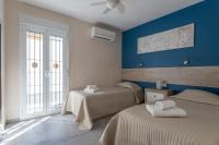Postel nebo postele na pokoji v ubytování Villa La Casita Burriana Nerja