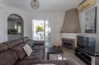 TV a/nebo společenská místnost v ubytování Villa La Casita Burriana Nerja