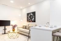 A television and/or entertainment centre at Genteel Home Feria