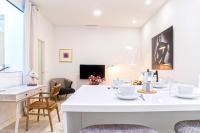 A television and/or entertainment centre at Genteel Home Feria
